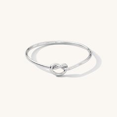 Our Love Knot Ring will be the daintiest addition to your collection. It can be worn as a symbol of eternity and love - making it the perfect gift for your loved one. Pair it with our simple stacking ring or any of our other rings for a dainty look! DETAILS 14k gold filled -or- sterling silver ring 1mm band Available in sizes 3-9 Safe for sensitive skin & shower safe Matching earrings: Love Knot Stud Earrings Bundle & Save up to 25% if you're buying multiple rings Simplistic Jewelry, Simple Stacking Rings, Love Knot Ring, Multiple Rings, Solid Gold Bracelet, Knot Stud Earrings, Knot Studs, Flat Back Earrings, Diamond Jewelry Necklace