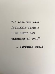 virginia woolf quote on white paper with black ink