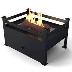 an open fire pit sitting on top of a table