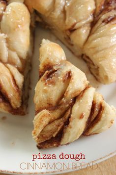 a piece of pizza dough on a plate with cinnamon bread in the middle and one slice missing