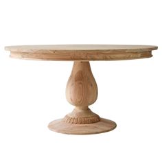 a round wooden table with two pedestals on each side and an oval base at the top