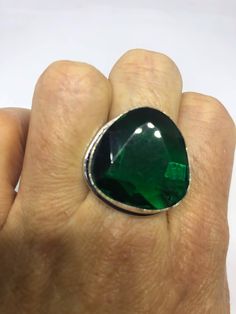 Large brilliant emerald green antique glass Ornate German Silver NOT 925 Vintage ring, does not tarnish Size 7 can be re sized, my jeweler charges a $10 - $15 fee All rings are shipped free in the US in a nice gift box. Check out our over a THOUSAND great reviews Engraving is $4 per letter and is not always perfect depending on the piece. It can take a few days if the jeweler is busy. This is payable to Paypal Judithsltd@gmail.com Green Jewelry With Large Stone For Gift, Green Large Stone Jewelry As A Gift, Classic Green Crystal Ring In Sterling Silver, Elegant Large Stone Green Emerald Ring, Elegant Large Green Emerald Ring, Green Jewelry With Large Round Stone, Unique Green Emerald Ring For Formal Occasions, Elegant Green Emerald Ring With Large Stone, May Birthstone Jewelry With Large Round Stone