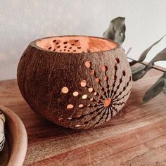 a close up of a coconut bowl on a table