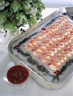 there is a tray with shrimp on it