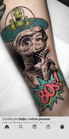 a person with a tattoo on their arm that has an image of a dog in a hat