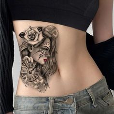 a woman with a rose tattoo on her stomach