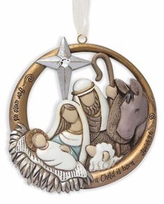 a christmas ornament with the birth of jesus