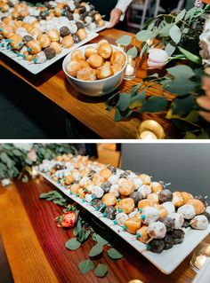 there are many different types of donuts on the table and one is decorated with greenery