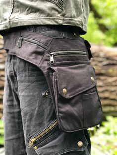 Multifunctional utility belt.  Very useful accessory at festivals, traveling, outdoor walks, and in everyday life.  With its 7 pockets, the pocket belt has a lot of storage space.  A large main compartment is made of a patch pocket with a small zippered pocket on top where you can put your mobile phone and wallet. Another zippered compartment is inside, where you can put your passport and valuables. There are two small pockets on the belt itself. ☆ Size / Dimensions ☆ This bag is available in 3 different colors and three adjustable sizes  S  M  L. Size S: Adjustability hip/waist: 86 - 97 cm / 34 -38 inch Size M: Adjustability hip/waist: 95 -110 cm/ 37 - 43 inch Size L: 102 -126 cm/ 40 - 50 inch (can be worn over the shoulder) ☆ Material ☆ Cotton fabric with metal press studs, Durable plast Holster Belt, Festival Belt, Holster Bag, Belt Holster, Tactical Clothing, Side Bags, Bum Bag, Hip Bag, Character Outfits