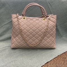 Large blush leather bag with handle straps and over the shoulder chain strap. Luxury Blush Rectangular Satchel, Blush Soft Leather Rectangular Bag, Blush Rectangular Shoulder Bag With Zipper, Blush Satchel Bags With Gold-tone Hardware, Elegant Pink Quilted Shoulder Bag, Shoulder Chain, Womens Purses, Quilted Leather, Chain Strap