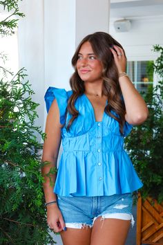 The top of the summer! pair with some white jeans for the perfect look! Underwire detailing flutter sleeve button down closure Affordable Blue Smocked Top With Ruffles, Cheap Blue Smocked Top With Ruffles, Cheap Denim Top With Ruffles For Summer, Affordable Blue Vacation Blouse, Classy Blouses, Hot Clothes, Senior Style, Church Outfits, Flutter Sleeve Top