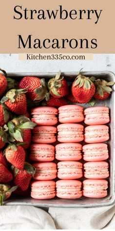 strawberry macarons in a baking pan with strawberries on the side and text overlay