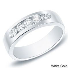 a white gold wedding ring with five diamonds