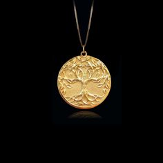 Discover our unique tree of life pendant, a timeless symbol of spirituality and interconnectedness. This pendant is a fine representation of spiritual symbolism and natural beauty. PENDANT INFORMATIONThis pendant is made of real, solid gold.• Made in USA• Material: 14k or 18k solid gold• Finish: polished• Height: 1.1" (28 cm) x Width: 0.95" (24 mm)• Pendant weight: approx. 6 grams (14k)• Bail: fits up to 4 mm chains• Solid back, not hollow• A certificate of authenticity is included• Delivered in Gold Jewelry For Blessing Events, Elegant Yellow Gold Tree Of Life Jewelry, Holistic Gold Pendant Jewelry, Elegant Yellow Gold Tree Of Life Necklace, Yellow Gold Tree Of Life Pendant Jewelry, Sterling Silver Yellow Gold Tree Of Life Necklace, Yellow Gold Sterling Silver Tree Of Life Necklace, Gold Nature-inspired Necklace With Large Pendant, Nature-inspired Yellow Gold Round Pendant Necklace