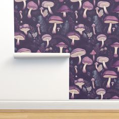 the wall paper has mushrooms on it in purple and pink colors, along with a wooden floor