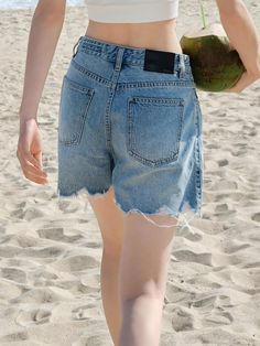 MO&Co. Cotton High Waist Denim Shorts Features : - Raw cuffs- Blue Denim- Loose fitCode: MBC2SOTT35 & MBC2SOTT09The length of size S is 35.5cmWhite: Model is 177cm tall and wearing a size M MATERIALS & CARE : Material: 100% CottonUse a washing machine at the mild process of 30℃Do not bleach, do not soakDo not tumble dryTips: 1. The leather part cannot be ironed or wiped.2. It is a normal phenomenon that denim products have slight discoloration.REMINDER: All items are measured manually. Please no