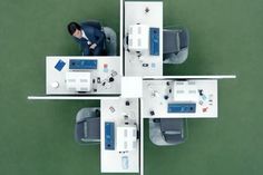 an overhead view of a man sitting at a desk