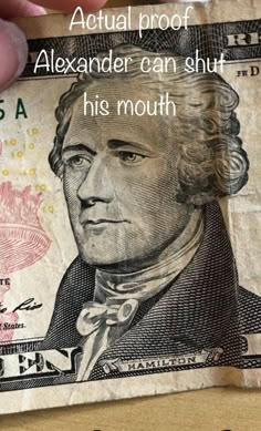 a person holding up a one dollar bill with the words, actual proof alexander can shut his mouth