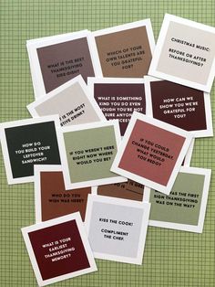 six cards with different sayings on them sitting on top of a green tablecloth