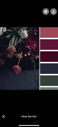 the color scheme is dark and red, with white flowers in it's center