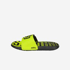 Oh gel yeah. Meet the new highlight of your summer attire and take pride in your slides by rocking these San Diego Padres Highlights Gel Slides! Features All-over bright, neon yellow and black design so you can rep the team in style Team logo display on straps, in case there were any doubts where your allegiances lie Wordmark team logo display on footbed for a little extra team spirit Gel overlay on footbed to make every step feel like a win Two-piece reinforced padded adjustable strap to keep y Green Casual Slides For Swimming, Green Casual Slides, Green Sporty Slides For Sports, Sporty Green Slides For Sports, Sporty Slides For Swimming In Summer, Sporty Slides For Summer Swimming, Summer Training Slides, Yellow Sporty Slides For Summer, Summer Sports Slides