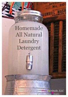 a large jar with the words homemade all natural laundry detergent on it