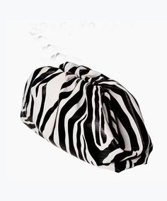 Indulge in the exquisite New Zebra Wrinkle Large Capacity Tote Handbag, a luxurious addition to your collection. The perfect blend of functionality and sophistication, this tote is a must-have for the stylish and discerning.This bag is made of fine Faux Leather fabric.Measurement: 18cm/7.02" * 38cm/14.82" * 7cm/2.73"Zip up closure. Inside pockets. Trendy Large Capacity Clutch, Trendy Handheld Clutch With Dust Bag, Trendy Large Capacity Pouch Clutch, Chic Large Capacity Clutch For Travel, Chic Large Capacity Travel Clutch, Chic Tote Cosmetic Bag For Daily Use, Chic Large Capacity Pouch Clutch, Chic Large Capacity Tote Clutch, Chic Large Capacity Cosmetic Bag For Travel