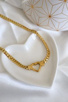 The Amora Necklace features a stunning retro heart shape, crafted from durable titanium steel and plated with 18k gold. Elevate your look with this timeless and elegant accessory. Retro Heart, Elegant Accessories, Elevate Your Look, Heart Shape, Silver Necklaces, Heart Shapes, 18k Gold, Plating, Silver