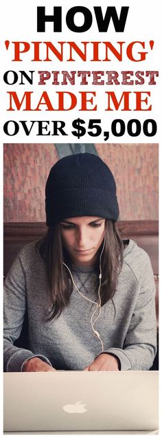 a woman is typing on her laptop while wearing a beanie and listening to headphones