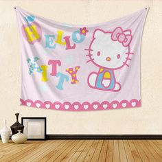 a hello kitty wall hanging in a room