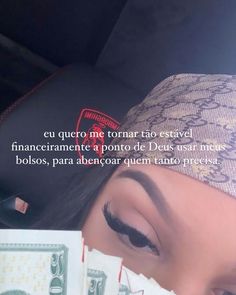 a woman with her eyes closed and money in front of her face, the caption reads