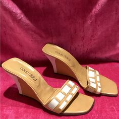 D E S C R I P T I O N Vintage Y2k Tan Colored And Leathered Wedges With A Tan And White Color Heel. This Shoe Is Also Opened Toed With A Tan And White Strap On The Front Of The Shoes. M E A S U R E M E N T Labeled As: Size 9 Insole Width: 3.75" Toe To Heel: 10" Heel Height: 4 1/2" Authenticity Guarantee All Items Sold In Our Shop Are 100% Guaranteed Authentic Or Your Money Back. Retro White Synthetic Heels, Retro Beige Heels For Summer, White Retro Synthetic Heels, Retro Beige Summer Heels, Retro Cream Heels For Summer, Cream Retro Heels For Summer, White Retro Heels For Summer, White Retro Summer Heels, Vintage White Heels For Spring