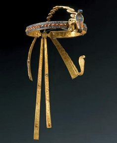 an egyptian gold and enamel headdress