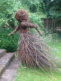 a sculpture made out of branches and twigs