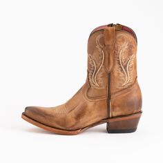 Good Golly, Miss Molly! Our new ankle zip boot combines classic Western style with fun fashion flare. Available in 5 bold color choices. Lady Boots, Ankle Cowboy Boots, Southern Life, Music Festival Fashion, Amazing Dresses, Western Ankle Boots, Boots Western, Coastal Cowgirl, Brown Heels