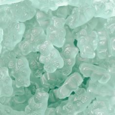 some ice cubes that have been frozen in the freezer and are light green