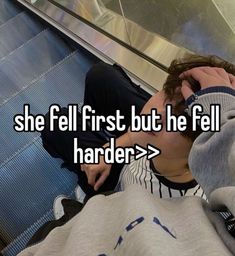 a woman sitting on an escalator with her head in her hands and the words she fell first but he fell harder