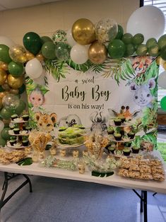 a baby boy is on his way dessert table