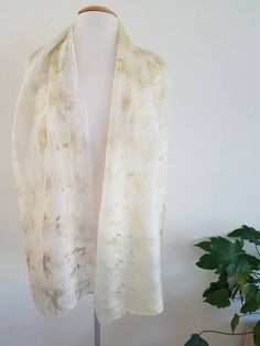 A wearable piece of art: hand eco printed silk scarf made of high quality ponge silk. The white silk scarf is hand dyed with local leaves. I usually harvest during walks in nature. For dyeing, I used the eco print technique. It makes use of the natural pigments in leaves and flowers. It takes craftsmanship and time to learn the technique and create wonderful prints of nature. I created my work with lots of love and passion for the craft.The silk is very soft and comfortable to wear. It suits sen White Bohemian Silk Scarves, White Silk Bohemian Scarves, White Silk Bohemian Scarf, Handmade White Silk Scarves, White Silk Scarf, Eco Print, Bridal Bolero, Natural Pigments, Bridal Shawl