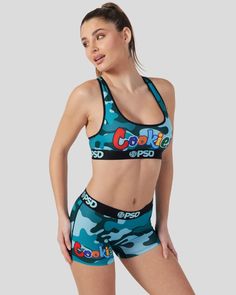 Meet the newest collab drop from Cookies x PSD. Featuring Cookies distinct logo with a colorful refresh on top of a blue camo print, this style really stands out. The Boy Short is a full-coverage bottom that’s made of a breathable, soft-to-the-touch poly blend with an ultra-flexible waistband and flatlock seams for added comfort. | PSD Women's Cookies - Blue Camo Short, Size XS, Polyester/Blend Urban Fitted Activewear For Streetwear, Blue Summer Activewear For Streetwear, Blue Casual Activewear With Graphic Print, Casual Blue Activewear With Graphic Print, Blue Logo Print Activewear For Sports, Blue Letter Print Activewear For Gym, Blue Letter Print Activewear For Summer, Multicolor Graphic Print Activewear For Sports, Blue Sporty Activewear With Letter Print