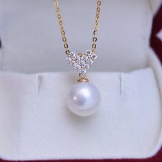 Elevate your style with this 10-11mm freshwater pearl necklace, showcasing a striking white and purple dual-tone pearl. Set within a cubic zirconia-adorned heart pendant, the lustrous pearl offers an enchanting blend of colors. Perfect for adding a touch of elegance to any ensemble, this necklace is a blend of classic allure and modern romance. Ideal as a standout gift or a personal treat. Necklace Chain, material 925 sterling silver, color in gold or white. it is matching with the color of the White Cubic Zirconia Necklace With Pearl Charm, White Heart Charm Necklace In Cubic Zirconia, White Cubic Zirconia Necklace With Heart Charm, Valentine's Day White Necklace With Pearl Pendant, Valentine's Day White Pearl Pendant Necklace, White Pearl Drop Necklace For Valentine's Day, Diamond White Pendant Pearl Necklace As Gift, Diamond White Pearl Pendant Necklace For Gifts, Pear-shaped Pearl Pendant Jewelry With Cubic Zirconia