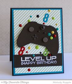 a birthday card with a video game controller on the front and words level up happy birthday