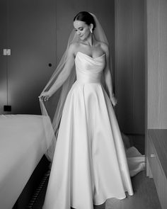 black and white photograph of a woman in a wedding dress