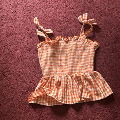 Orange And White Crop Top Which Is Brand New And Never Been Worn For 14-16 Year Olds Playful Orange Tops For Summer, Playful Orange Summer Tops, Playful Orange Beach Top, Casual Summer Tops For Picnic, Casual Gingham Tops For Beach, Cute Gingham Tops For Summer, Cute Orange Beach Tops, Cute Orange Tops For Day Out, White Summer Tops For Picnic