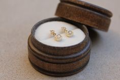 Lovely minimal 14k solid yellow gold .09 ctw diamond studs, perfect sparkly everyday look! * Handmade in the USA. * Gold KT: 14K solid yellow gold. * Primary gemstone: : 2 mm round diamond (.06 ctw). * Secondary Gemstone: 1.5 round diamond (.03 ctw). * Earring Closure: Screw Back. * Earring Style: Drop Studs. * Earring length: 11 mm approximately. * Setting Type: Prong Setting. * Additional Notes: This item can be customized. * Ready to ship. FREE SHIPPING! Gift Yellow Gold Diamond Earrings With Single Cut, 14k Gold Diamond Earrings With Bezel Setting For Wedding, 14k Gold Rose Cut Diamond Earrings For Gift, 14k Gold Bezel Set Diamond Earrings For Wedding, Timeless Rose Cut Diamond Earrings As Gift, 14k Gold Diamond Earrings With Accents For Gift, 14k Gold Diamond Earrings With Diamond Accents As Gift, 14k Gold Diamond Earrings With Diamond Accents, Dainty Diamond Earrings With Single Cut Diamonds For Wedding