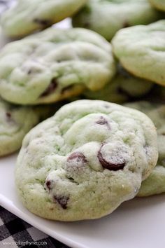 green chocolate chip cookies on a white plate