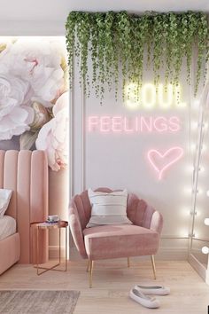 a pink chair sitting in front of a white wall with flowers and lights on it