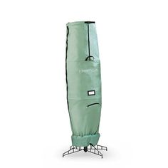 a large green garment bag on a stand