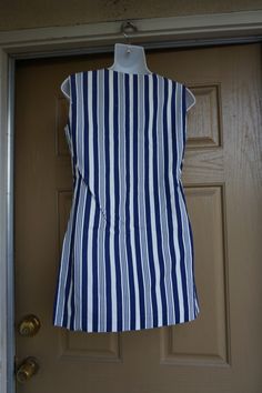 "Vintage 1960s ultra short striped mini dress small. Please see measurements. In good vintage condition. 18\" across front armpit to armpit -doubles to 36\" 17\" across front of waist -doubles to 34\" 18\" across hips -doubles to 40\" 29\" total length" Spring Sleeveless Mini Dress With Vertical Stripes, Pinstripe Sleeveless Spring Dress, Pinstripe Sleeveless Dress For Spring, Spring Pinstripe Sleeveless Dress, Striped Sleeveless Lined Mini Dress, Sleeveless Striped Lined Mini Dress, Fitted Sleeveless Mini Dress With Vertical Stripes, Striped Fitted Cotton Mini Dress, Fitted Striped Cotton Mini Dress