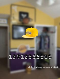 a yellow hat hanging from the ceiling in a room